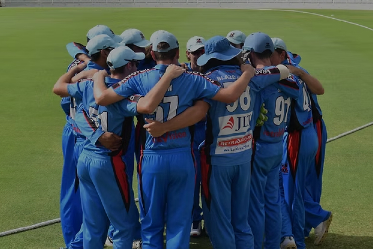Cricket team huddle